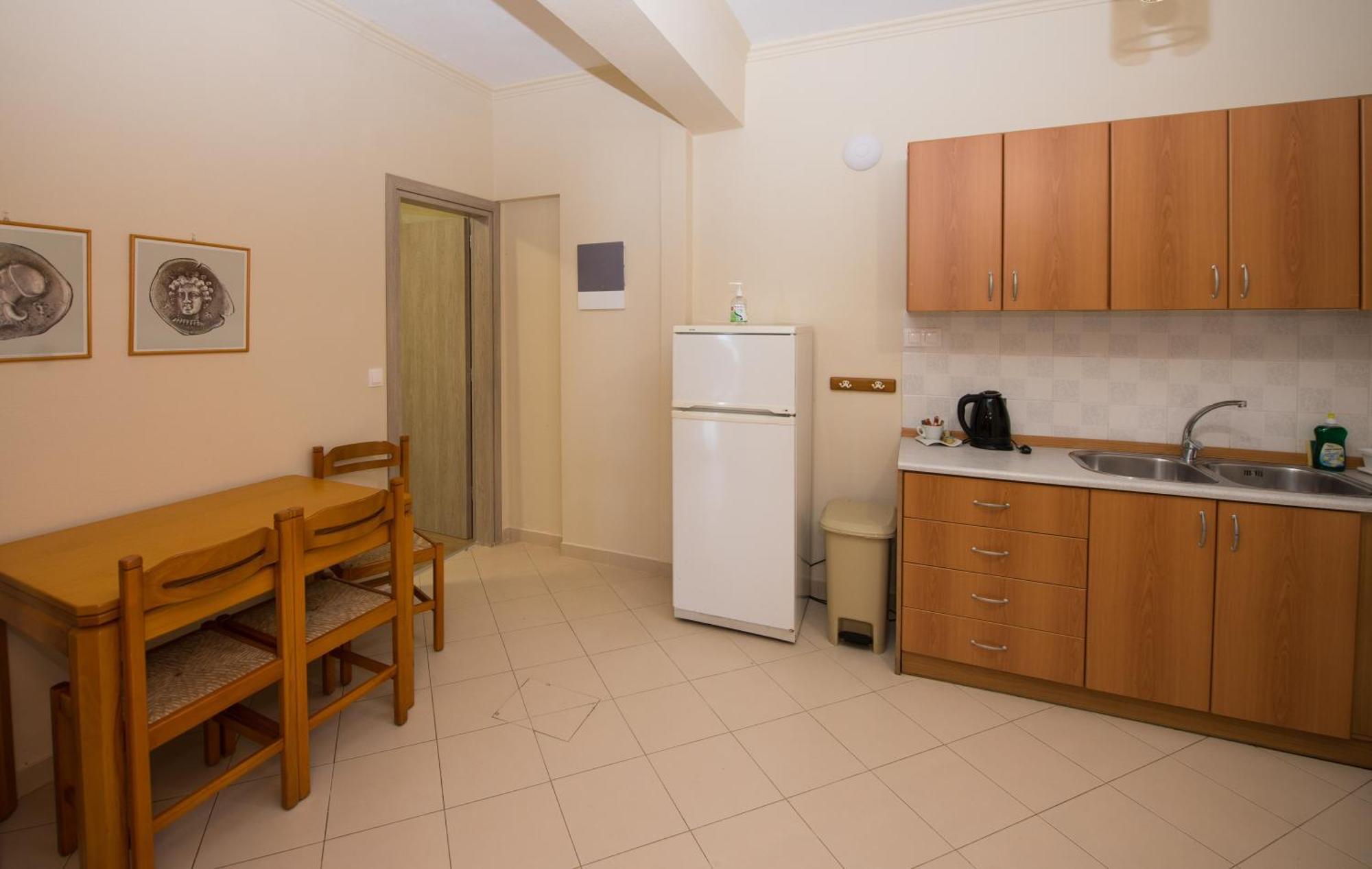 Dionysos Apartments Apraos Quarto foto